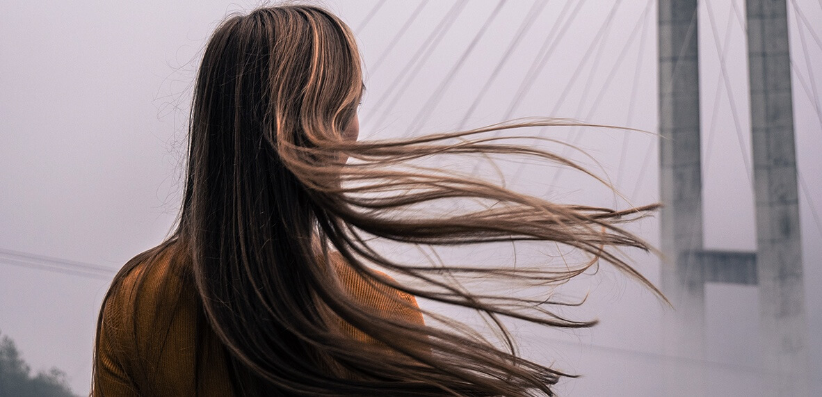 hair blowing in wind