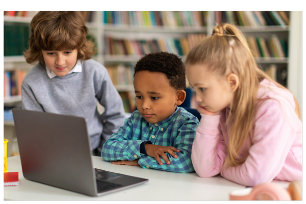 Children looking at a laptop